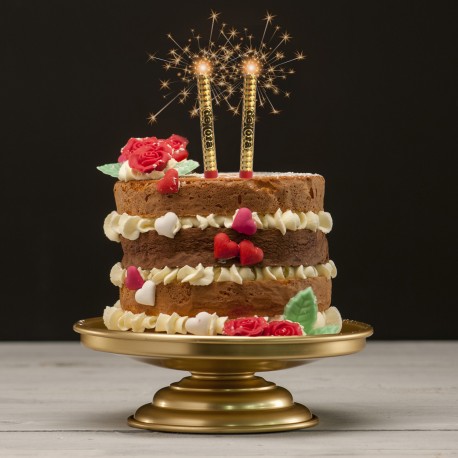 La bougie d'anniversaire comme décoration de gâteau